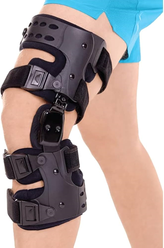 Patient wearing a rigid unloader knee brace for osteoarthritis management