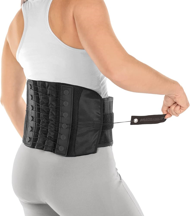 A patient wearing a lumbar corset brace for spinal osteoarthritis support